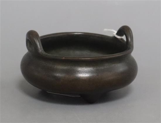 A Chinese bronze tripod censer height 6.5cm